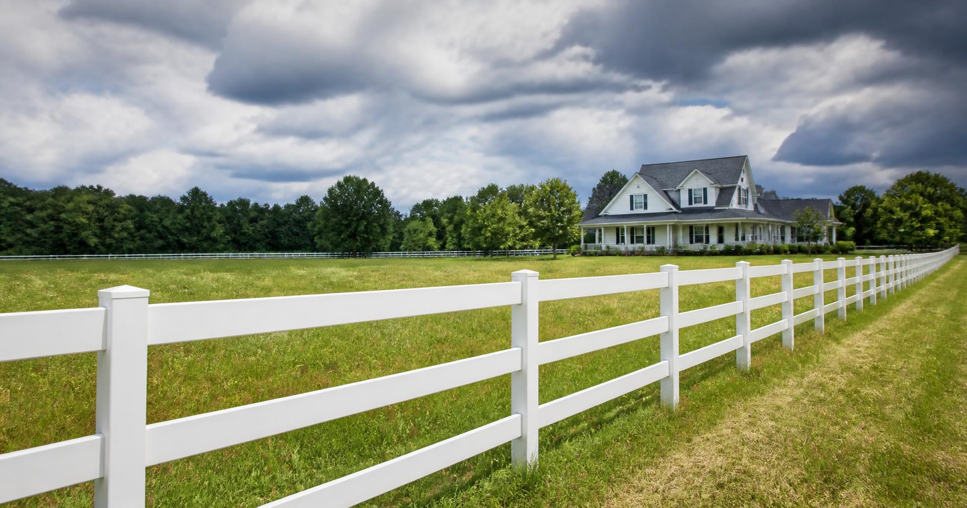 White ranch rail fence on a Texas property
